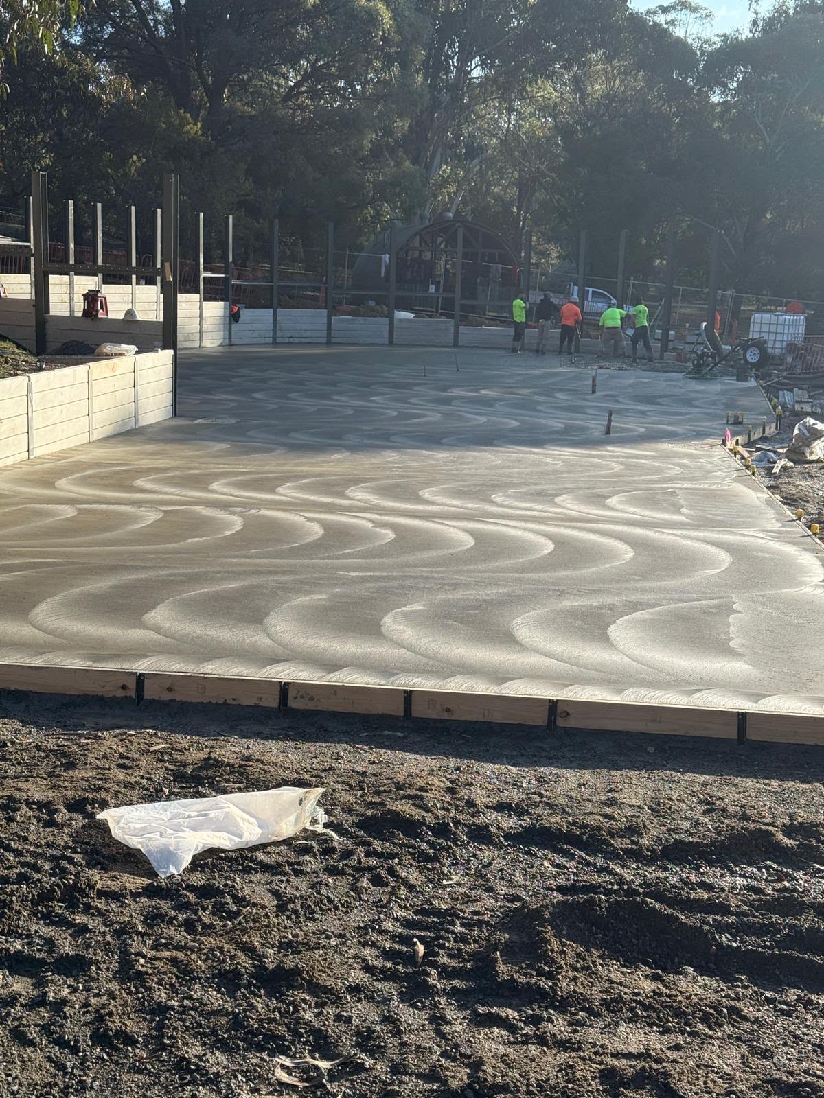 Curved textured finish on a concrete slab by Gen Z Concrete